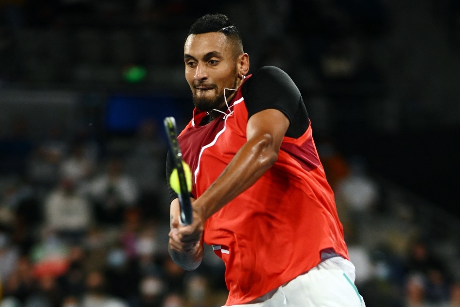 Australia's Nick Kyrgios in action during his first round match against Britain's Liam Broady. James Gourley, Reuters.