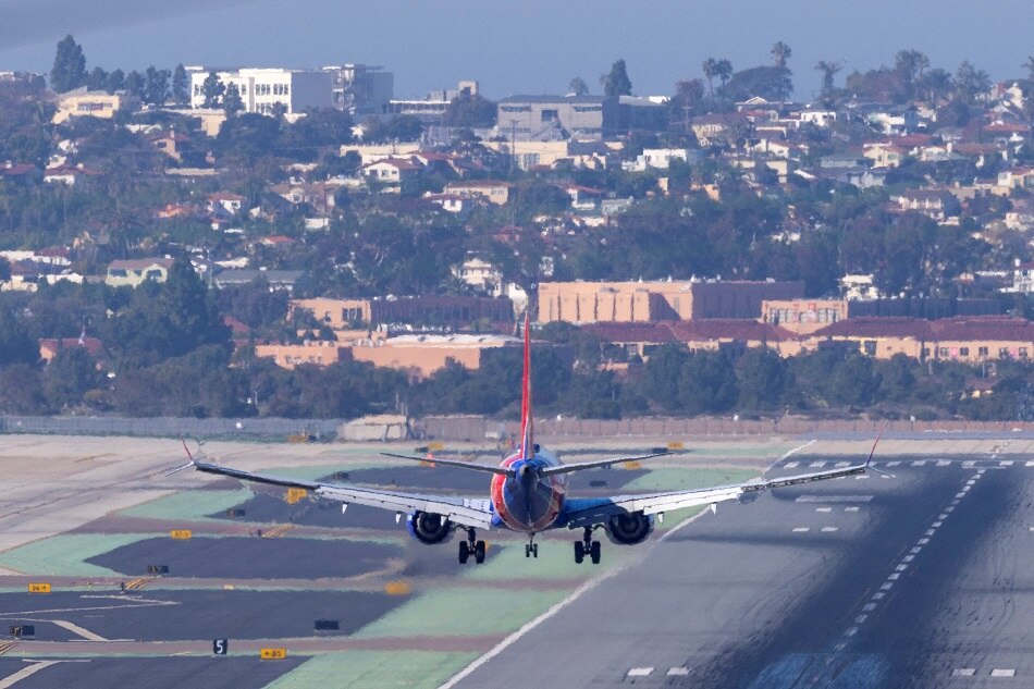 A Southwest Airlines plane approaches to land at San Diego International Airport on January 6, 2022, as US telecom companies, airlines and the FAA continue to discuss the potential impact of 5G wireless services on aircraft electronics. Mike Blake, Reuters/file