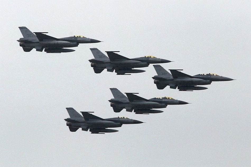 Taiwan Air Force's F-16 fighter jets fly during the annual Han Kuang military exercise at an army base in Hsinchu, northern Taiwan, July 4, 2015. Patrick Lin, Reuters/File