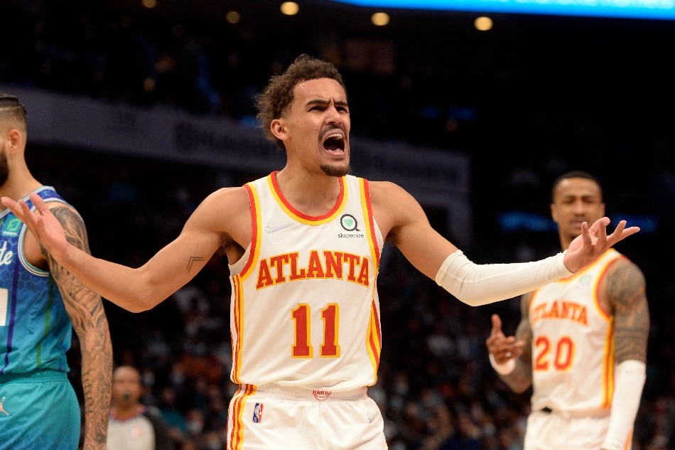 Atlanta Hawks guard Trae Young (11) reacts after being called on a foul during the second half against the Charlotte Hornets at The Spectrum Center. Sam Sharpe, USA TODAY Sports/Reuters