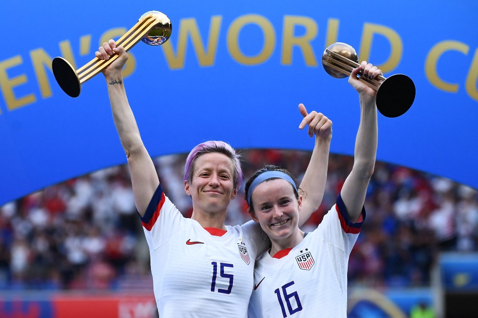 United States' forward Megan Rapinoe poses with the Golden Ball next to United States' midfielder Rose Lavelle with the Bronze Ball after the France 2019 Women’s World Cup football final match between USA and the Netherlands, on July 7, 2019, at the Lyon Stadium in Lyon, central-eastern France. File photo. Franck Fife, AFP.