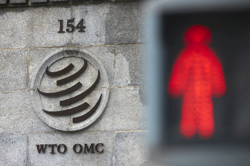 A logo is pictured on the World Trade Organisation (WTO) building before a ministerial meeting to discuss a draft agreement on curbing subsidies for the fisheries industry in Geneva, Switzerland, July 15, 2021. Denis Balibouse, Reuters/File Photo