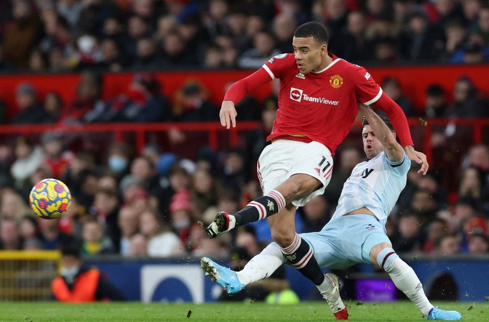 Manchester United's Mason Greenwood in action with West Ham United's Aaron Cresswell. File Photo. Phil Noble, Reuters.