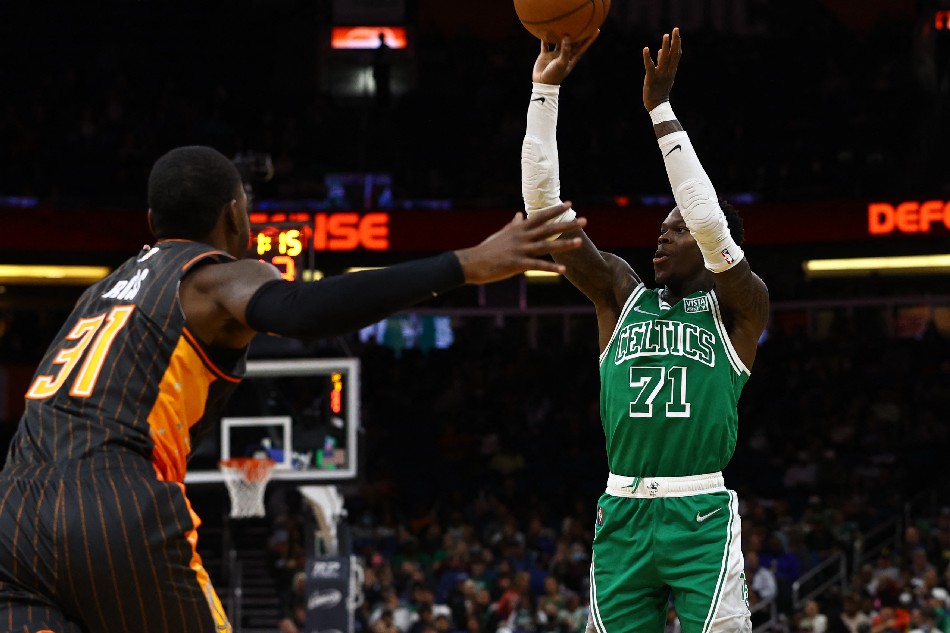 Boston Celtics guard Dennis Schroder (71) makes a three pointer against the Orlando Magic during the second half at Amway Center. Kim Klement, USA TODAY Sports/Reuters