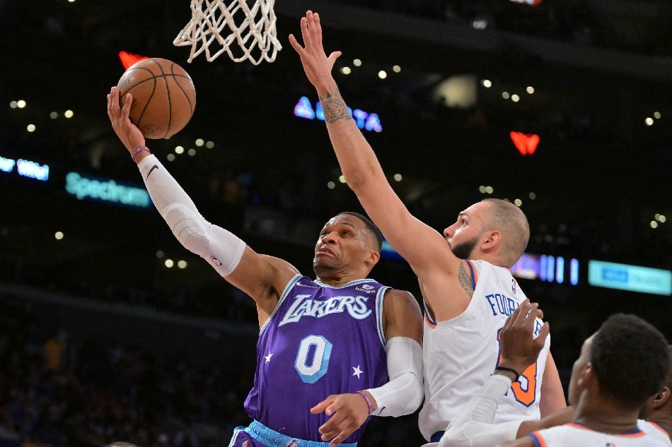 Los Angeles Lakers guard Russell Westbrook (0) shoots against the  Washington Wizards during the first half