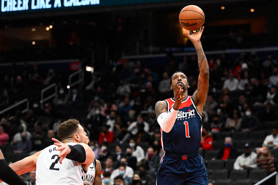 Washington Wizards guard Kentavious Caldwell-Pope (1) shoots over Brooklyn Nets forward Blake Griffin (2) at Capital One Arena. Brad Mills, USA TODAY Sports/Reuters