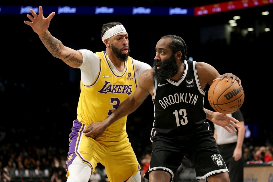 Nets guard James Harden and Lakers forward Anthony Davis in action in their game on January 25, 2022. Brad Penner, USA Today Sports/Reuters