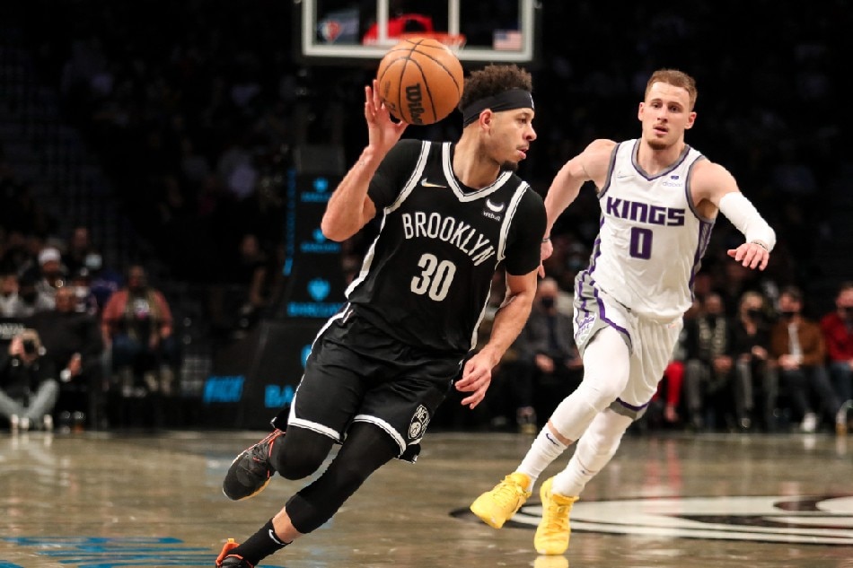 Brooklyn Nets guard Seth Curry (30) drives past Sacramento Kings guard Donte DiVincenzo (0) in the fourth quarter at Barclays Center. Wendell Cruz, USA TODAY Sports/Reuters
