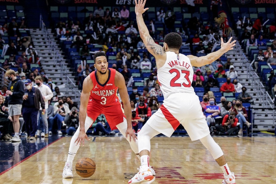 New Orleans Pelicans guard CJ McCollum (3) dribbles against Toronto Raptors guard Fred VanVleet (23) during the second half at the Smoothie King Center. Stephen Lew, USA TODAY Sports/Reuters
