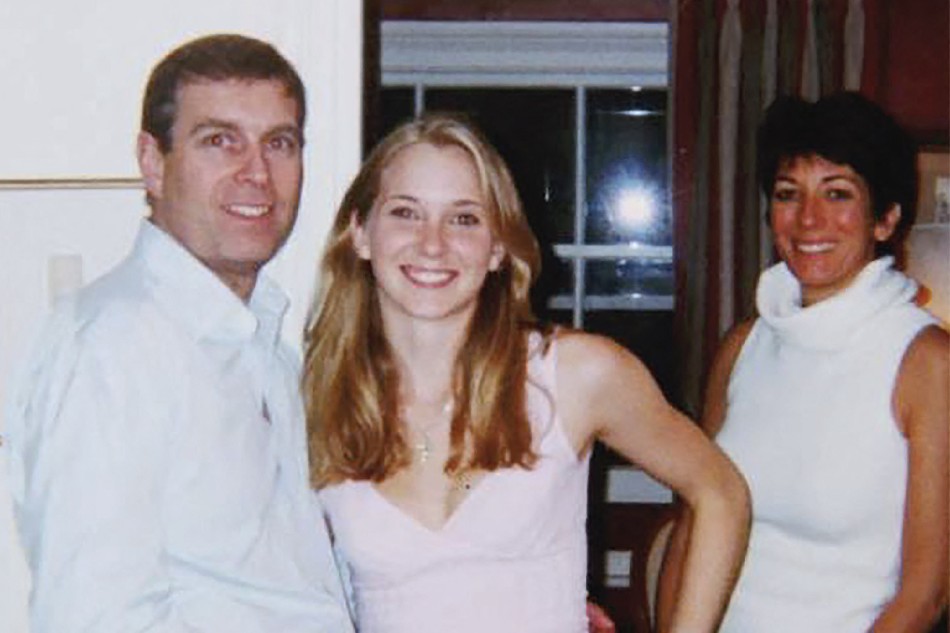 An undated handout photo taken at an undisclosed location and released on August 9, 2021 by the United States District Couty for the Southern District of New York shows (L-R) Prince Andrew, Virginia Giuffre, and Ghislaine Maxwell posing for a photo. A US judge on January 12, 2022 denied Prince Andrew's plea to dismiss a sexual assault lawsuit brought against the British royal, paving the way for the case to proceed, a court filing showed. Handout/US District Court - Southern District of New York/ Agence France-Presse