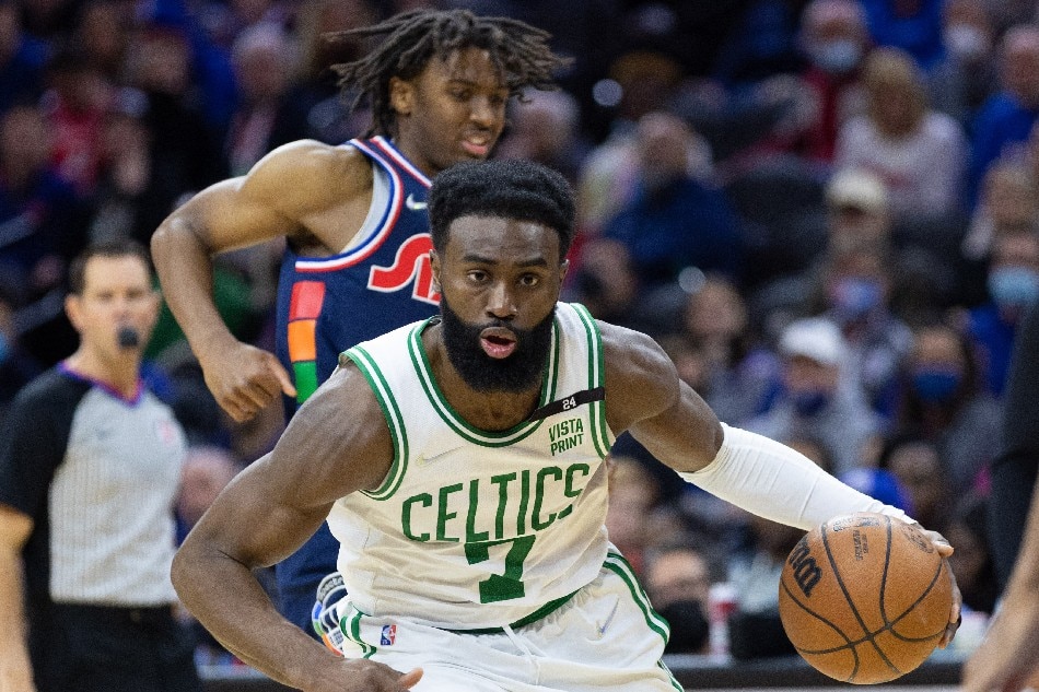 Boston Celtics guard Jaylen Brown (7) dribbles past Philadelphia 76ers guard Tyrese Maxey (0) during the third quarter at Wells Fargo Center. Bill Streicher, USA TODAY Sports via Reuters