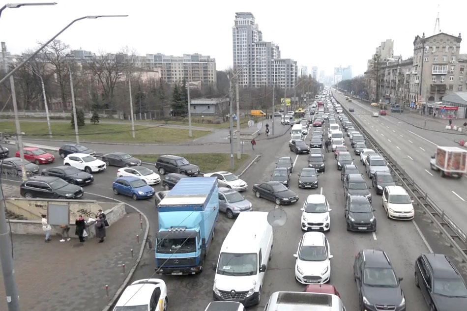Heavy traffic is seen on a road heading out of the Ukrainian capital Kyiv, as Russian military operation begins, in Ukraine, February 24, 2022 in this screen grab taken from a live video. Reuters TV/via Reuters