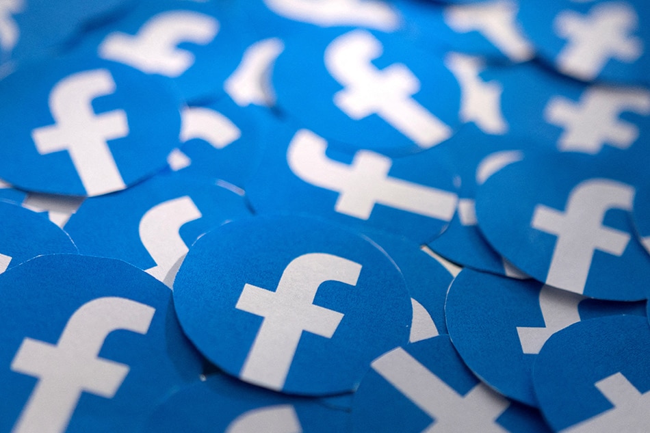 Printed Facebook logos are seen in this illustration taken February 15, 2022. Dado Ruvic, Reuters/Illustration//File Photo