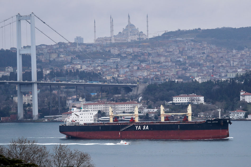 Marshall Islands-flagged bulk carrier Yasa Jupiter, a Turkish-owned ship which was hit by a bomb off the coast of Ukraine's port city Odessa on Thursday, sails in the Bosphorus in Istanbul, Turkey February 25, 2022. Murad Sezer, Reuters