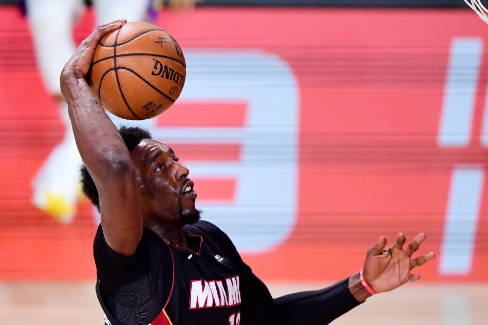 Bam Adebayo (13) of the Miami Heat dunks the ball during the third quarter against the Los Angeles Lakers in Game Six of the 2020 NBA Finals at AdventHealth Arena at the ESPN Wide World Of Sports Complex on October 11, 2020 in Lake Buena Vista, Florida. File photo. Douglas P. DeFelice, Getty Images/AFP