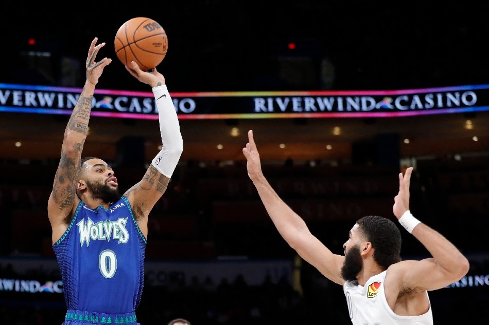 Minnesota Timberwolves guard D'Angelo Russell (0) shoots as Oklahoma City Thunder forward Kenrich Williams (34) defends during the second quarter at Paycom Center. Alonzo Adams, USA TODAY Sports via Reuters
