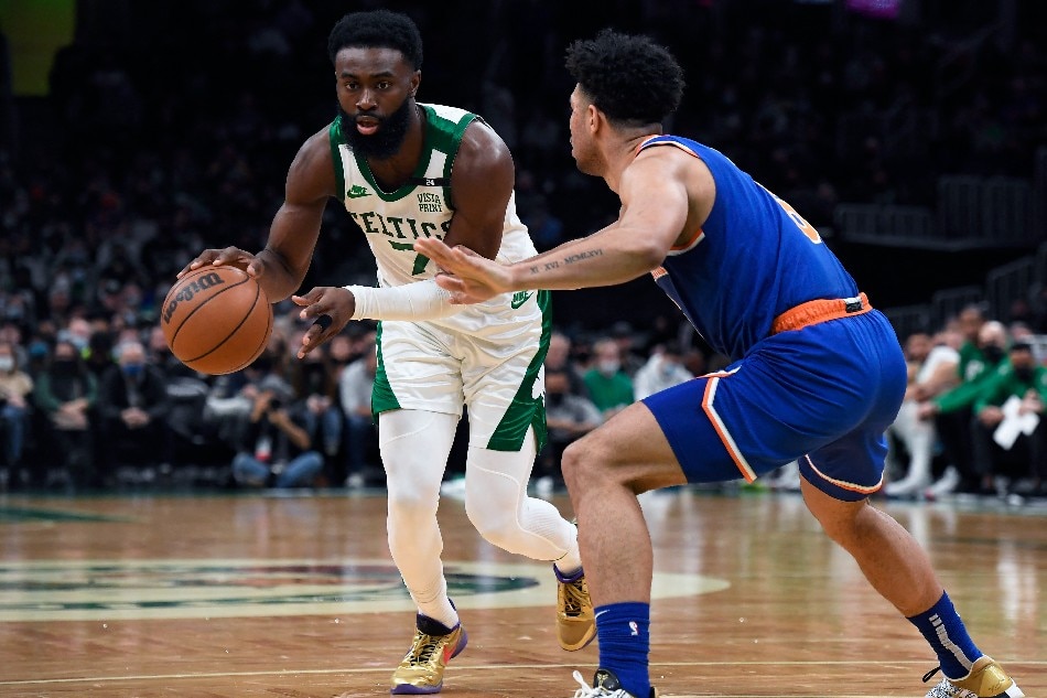 Boston Celtics guard Jaylen Brown (7) controls the ball against New York Knicks guard Quentin Grimes (6) during the second half at TD Garden. Bob DeChiara, USA TODAY Sports/Reuters.