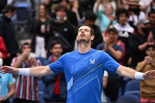Tennis: Murray roars into Melbourne round two