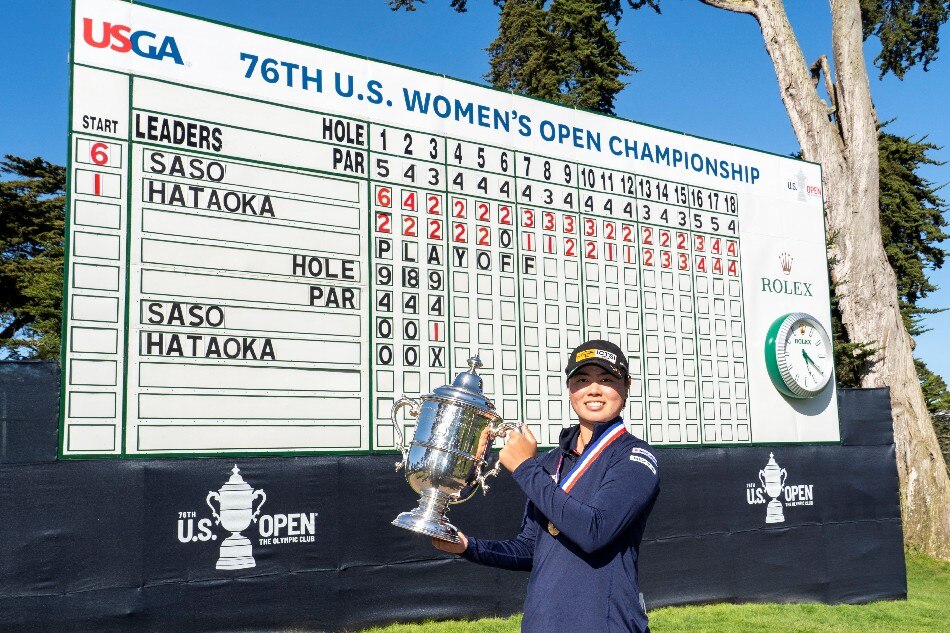 Yuka Saso hoists the US Open trophy after winning in a sudden death playoff over Nasa Hataoka following the final round of the U.S. Women's Open golf tournament at The Olympic Club. File Photo. Kyle Terada, USA TODAY Sports/Reuters.
