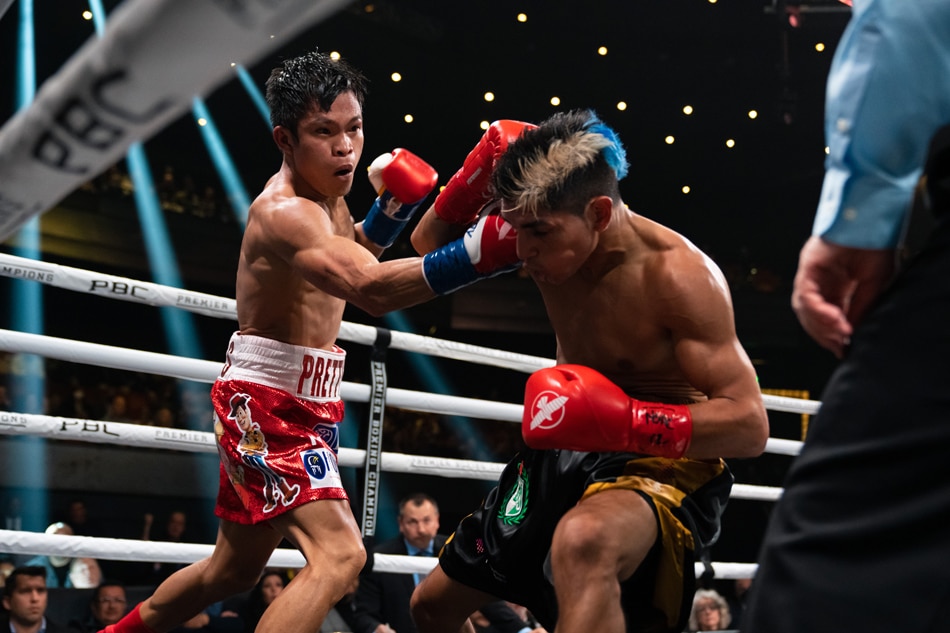 Filipino boxing Jerwin Ancajas battles Argentina's Fernando Martinez in a junior bantamweight clash in Las Vegas. Ryan Hafey, Premier Boxing Champions.