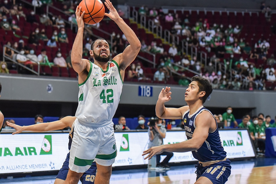Benjamin Philips grabs a rebound during La Salle's match against National University. UAAP Media