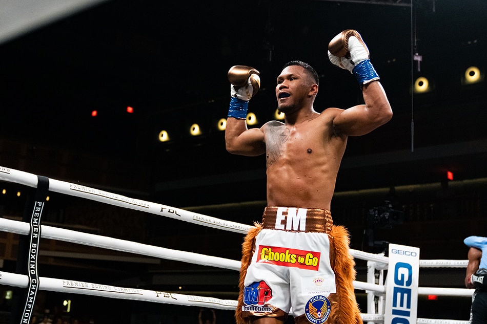 Eumir Marcial celebrates after defeating Isiah Hart in a professional middleweight bout in Las Vegas, Nevada. Ryan Hafey, Premier Boxing Champions