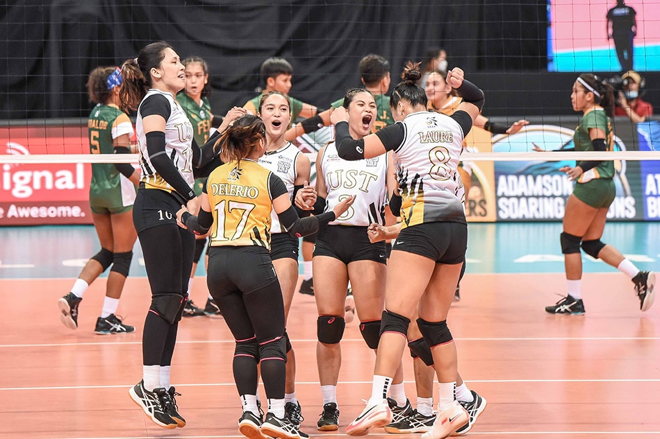 The UST Golden Tigresses celebrate after scoring against the FEU Tamaraws in their first game of UAAP Season 84. UAAP Media.