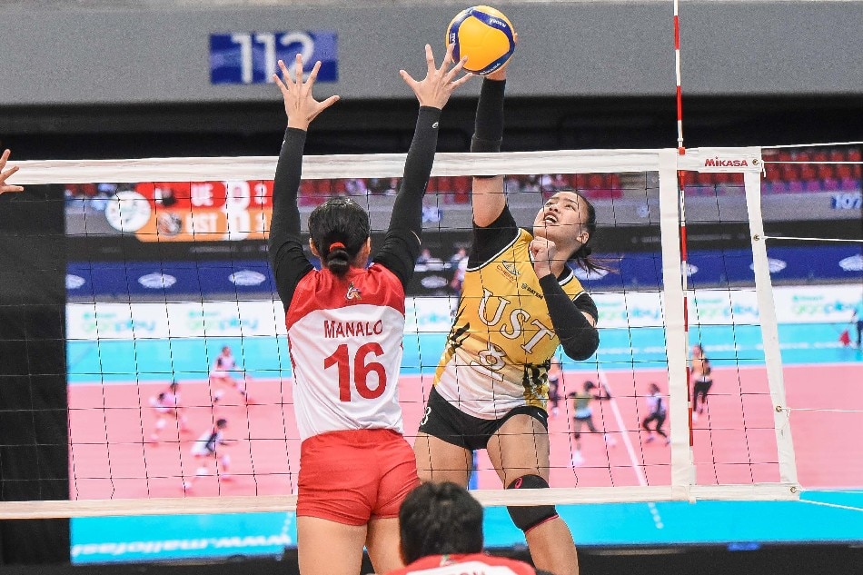 UST captain Eya Laure (8) spikes against the UE Lady Warriors in their UAAP Season 84 first round game. UAAP Media