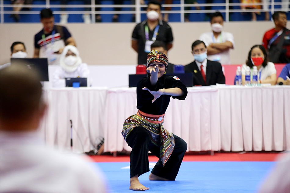 Francine Padios performs in a pencak silat final at the SEA Games in Hanoi, Vietnam on May 11, 2022. Luong Thai Linh, EPA-EFE