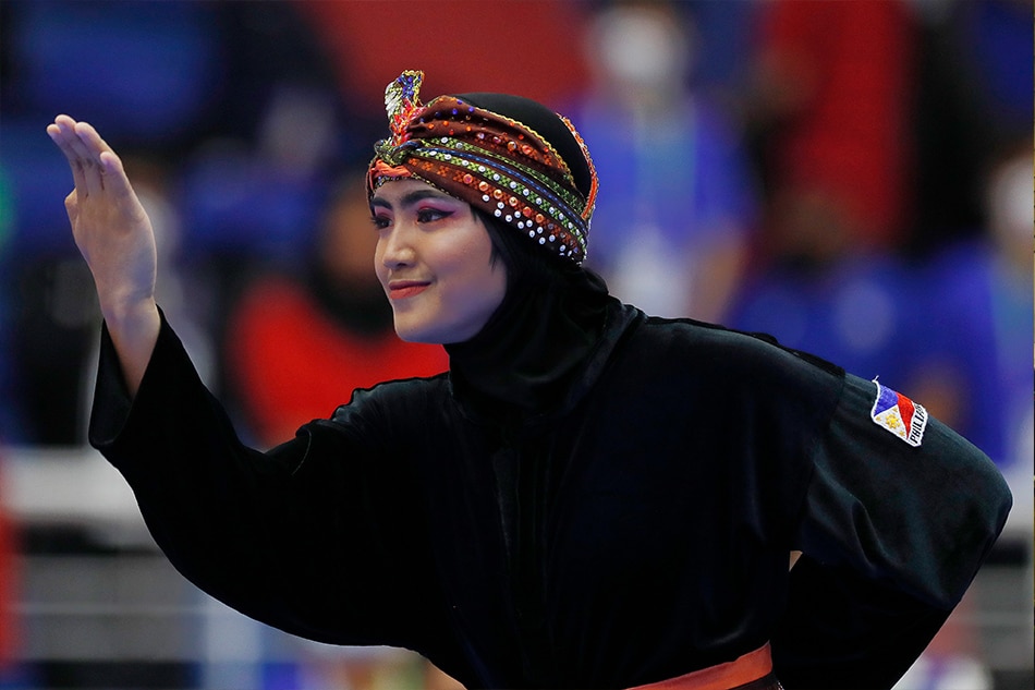 Francine Padios performs during the women's seni (artistic) tunggal (single) finals in pencak silat at the Southeast Asian Games in Hanoi, Vietnam on May 11, 2022. Luong Thai Linh, EPA-EFE