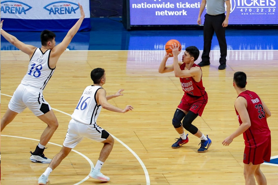 Despite an injury setback, Cansino said the bond he has formed with his teammates made it easy for him to rejoin the Fighting Maroons in Game 3. George Calvelo, ABS-CBN News