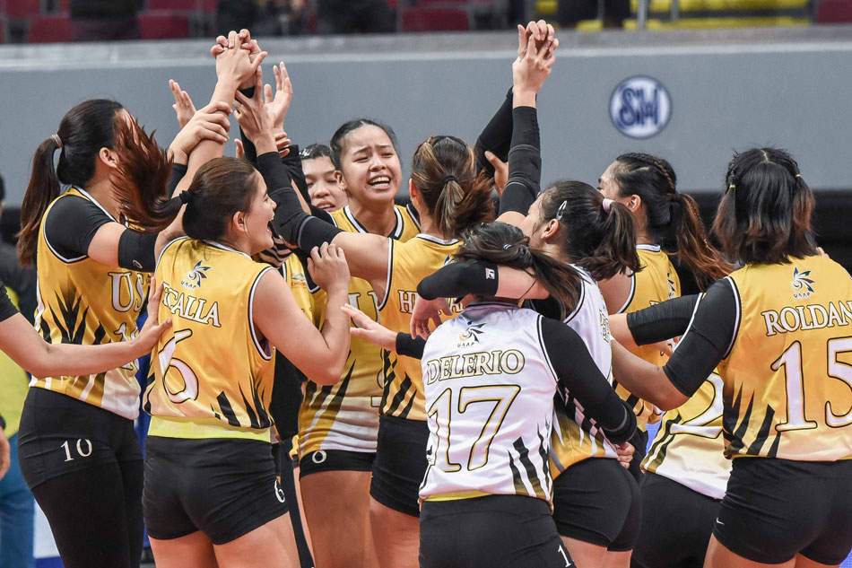 UST captain Eya Laure celebrates with her teammates after a comeback win against the De La Salle Lady Spikers in their UAAP Season 84 first round match. UAAP Media.