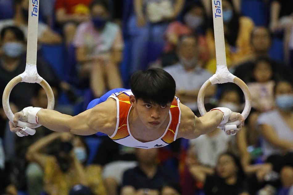Filipino gymnast Carlos Yulo competes in the still rings apparatus in the 31st Southeast Asian Games in Hanoi, Vietnam. PSC/POC pool photo.