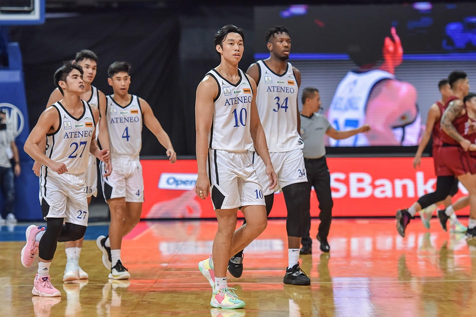 Ateneo's Dave Ildefonso walks onto the court with the Blue Eagles in Game 3 of the UAAP Season 84 Finals. UAAP Media.