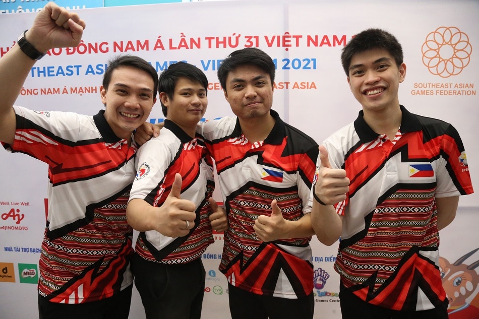 Ian Dychangco (from left), Merwin Tan, Patrick Nuqui, and Ivan Malig celebrate winning gold in the men's team of four event in bowling at the Southeast Asian Games in Vietnam. PSC/POC Media