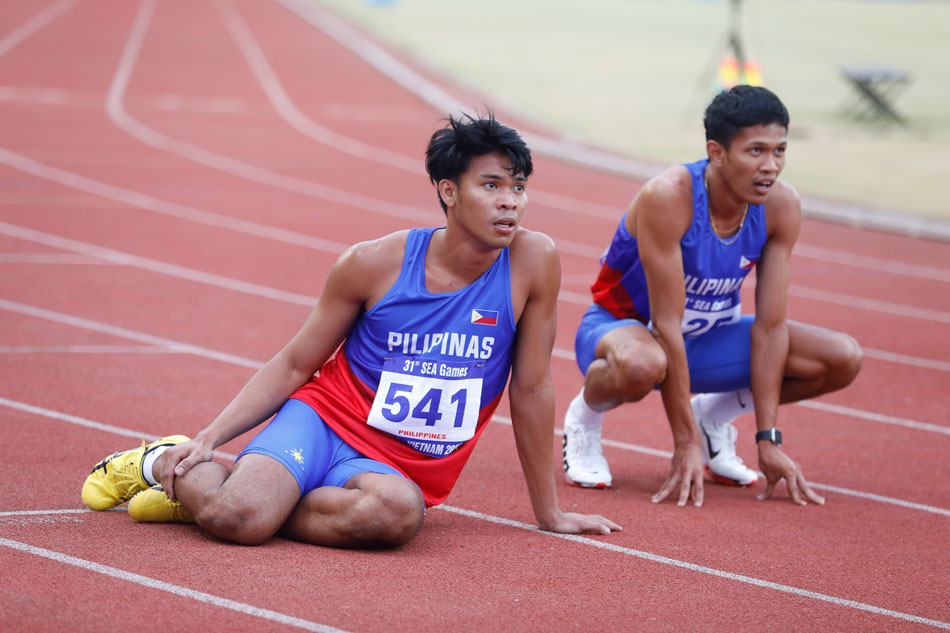  Frederick Ramirez Cabatu (L) and Michael Carlo Del Prado Grafilo of Philippines (R) react after the men's 400m final of Athletic events at 31st Southeast Asian Games (SEA Games 31) in Hanoi, Vietnam, 15 May 2022. Luong Thai Linh, EPA-EFE