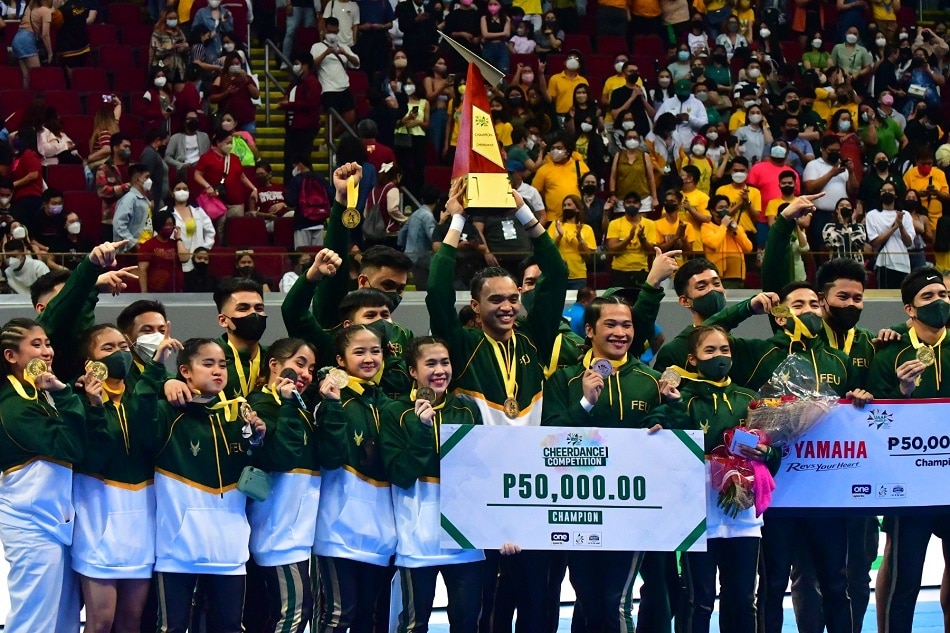 The FEU Cheering Squad wins the UAAP Season 84 cheerdance title at the Mall of Asia Arena in Pasay City on May 22, 2022. Mark Demayo, ABS-CBN News