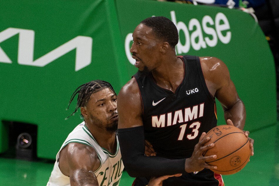 Miami Heat center Bam Adebayo (R) keep the ball from Boston Celtics guard Marcus Smart (L) during the first half of Game 3 of their NBA Eastern Conference Finals playoff series at the TD Garden in Boston, Massachusetts, USA, 21 May 2022. CJ Gunther, EPA-EFE.