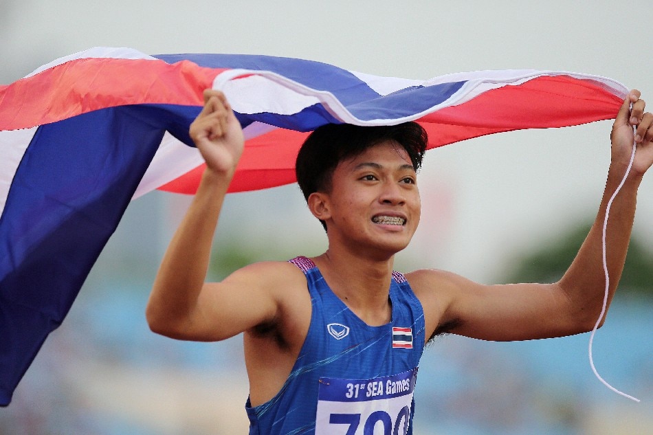 Puripol Boonson of Thailand celebrates his gold medal after the men’s 100m final of the Athletics events at 31st Southeast Asian Games in Hanoi, Vietnam, 18 May 2022. Luong Thai Linh, EPA-EFE