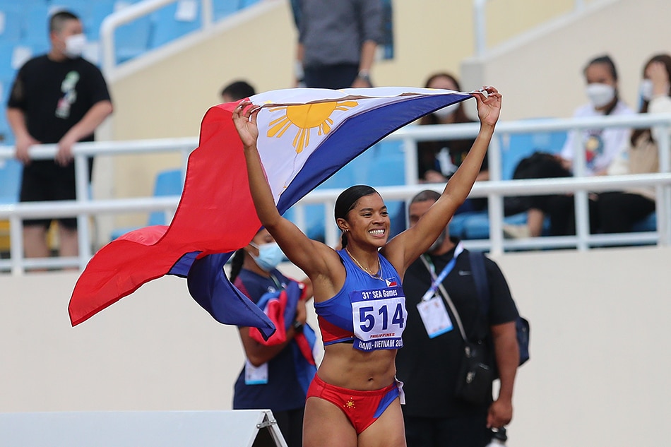 Kayla Richardson of Philippines celebrates her gold medal after the women’s 100m final of the Athletics events at 31st Southeast Asian Games in Hanoi, Vietnam, 18 May 2022. Luong Thai Linh, EPA-EFE.