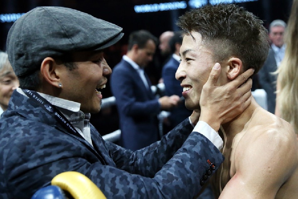 Naoya Inoue (right) of Japan celebrates with Filipino-American boxer Nonito Donaire after beating Emmanuel Rodriguez of Puerto Rico during their Bantamweight World Boxing Super Series semifinal and IBF World Championship bout in Glasgow in this May 18, 2019 file photo. Robert Perry, EPA-EFE