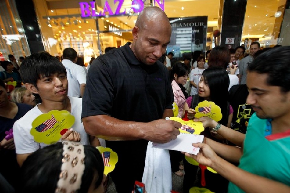 Lakers assistant coach and former NBA player Darvin Ham signs autographs during the US Embassy's Sports Envoy Program ceremony at a Taw Win Center Shopping Mall, in Yangon, Myanmar, August 26, 2012. Lynn Bo Bo, EPA/file