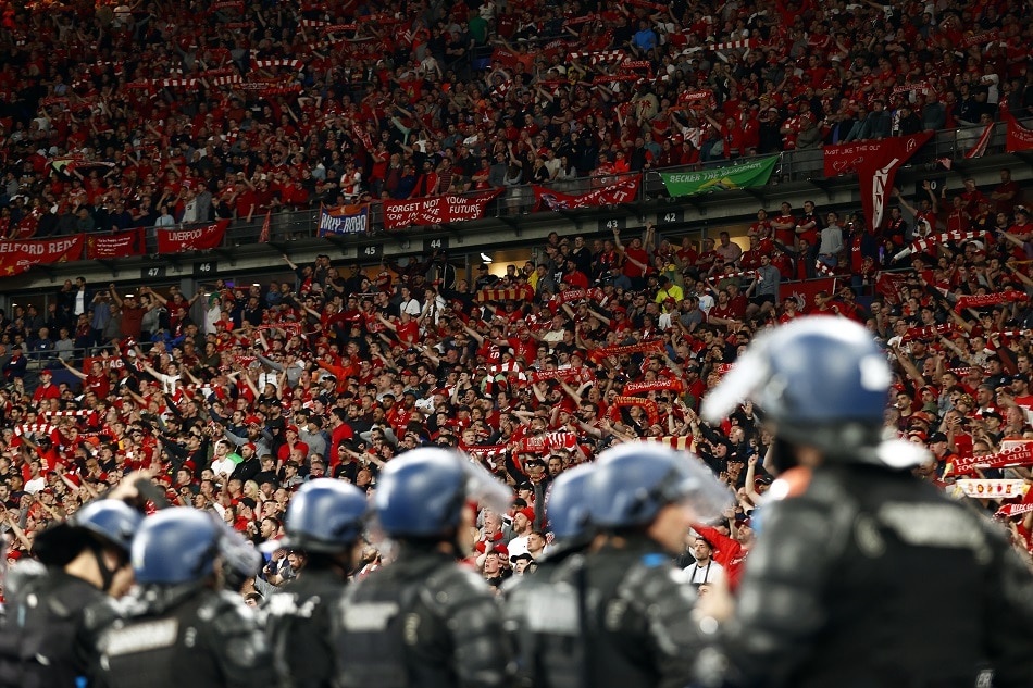 French riot police in front of Liverpool supporters at the end of the UEFA Champions League final between Liverpool FC and Real Madrid at Stade de France in Saint-Denis, near Paris, France, 28 May 2022. Real Madrid won 1-0. Yoan Valat, EPA-EFE