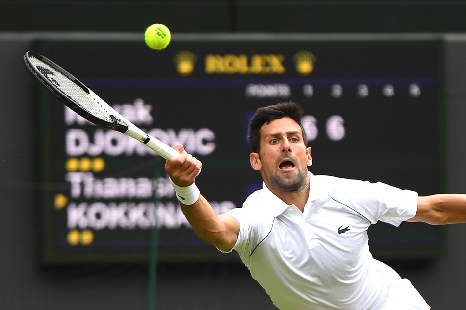Novak Djokovic in action against Thanasi Kokkinakis at the Wimbledon Championships on June 29, 2022. Neil Hall, EPA-EFE