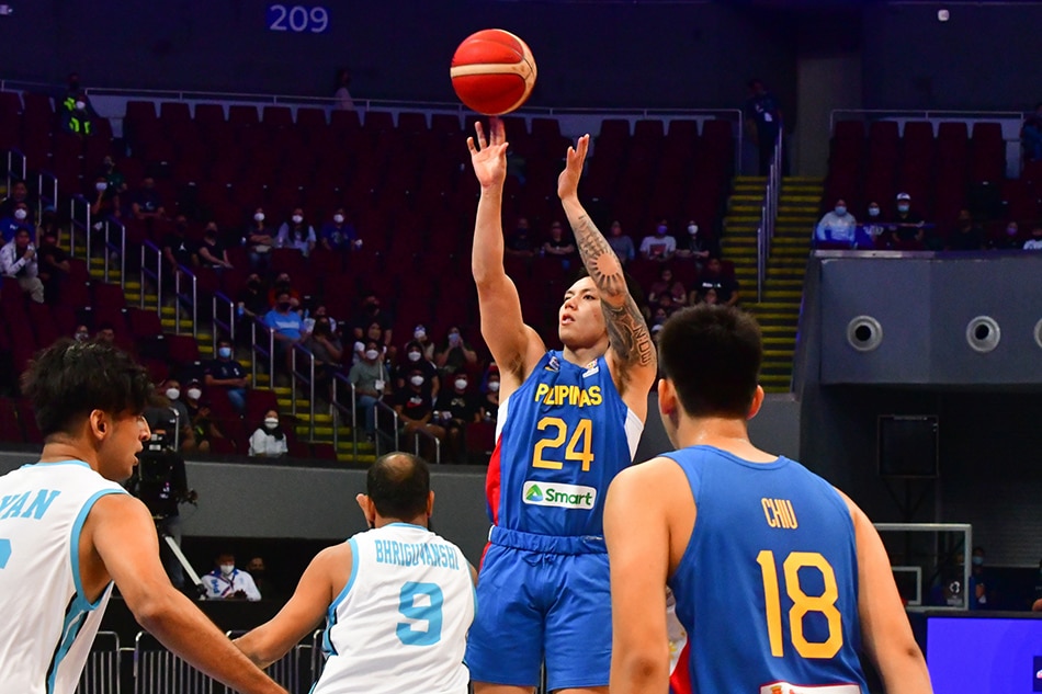 Dwight Ramos (24) puts up a shot for Gilas Pilipinas against India in their FIBA World Cup Asian Qualifier at the Mall of Asia Arena. Mark Demayo, ABS-CBN News.
