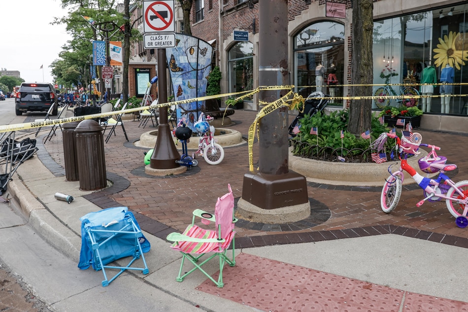 Chairs and bicycles lie abandoned after people fled the scene of a mass shooting at a 4th of July celebration and parade in Highland Park, Illinois, USA. A gunman opened fire as people gathered to watch a Fourth of July parade in Highland Park, Illinois, killing at least 6 people and injuring dozens. Taannen Maury, EPA-EFE 