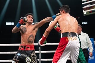 Boxing: Vargas survives knockdown to dethrone Magsayo
