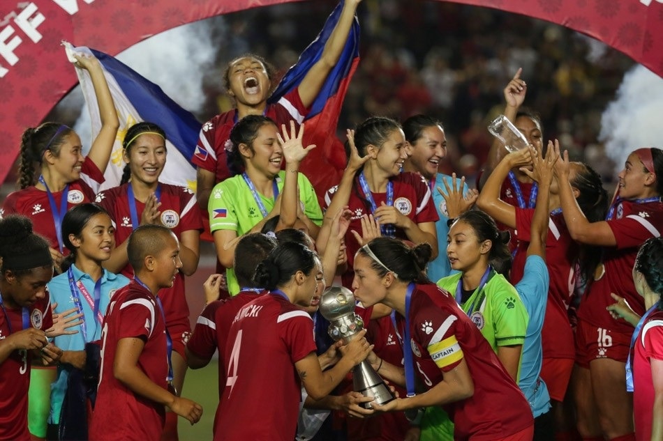 Members of the Philippine Women's National Football Team celebrate after winning the ASEAN Football Federation (AFF) Women's Championship match against Thailand in Manila on July 17, 2022. George Calvelo, ABS-CBN News
