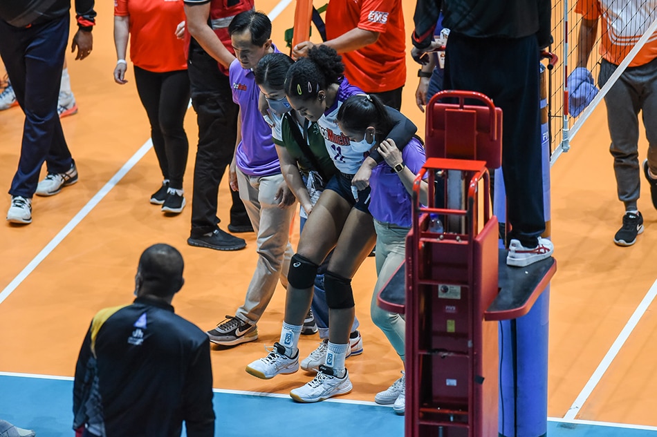 Choco Mucho middle blocker Aduke Ogunsanya is helped off the court after suffering a knee injury in their match against Army Black Mamba. She was later diagnosed with a torn ACL in her right knee. PVL Media.