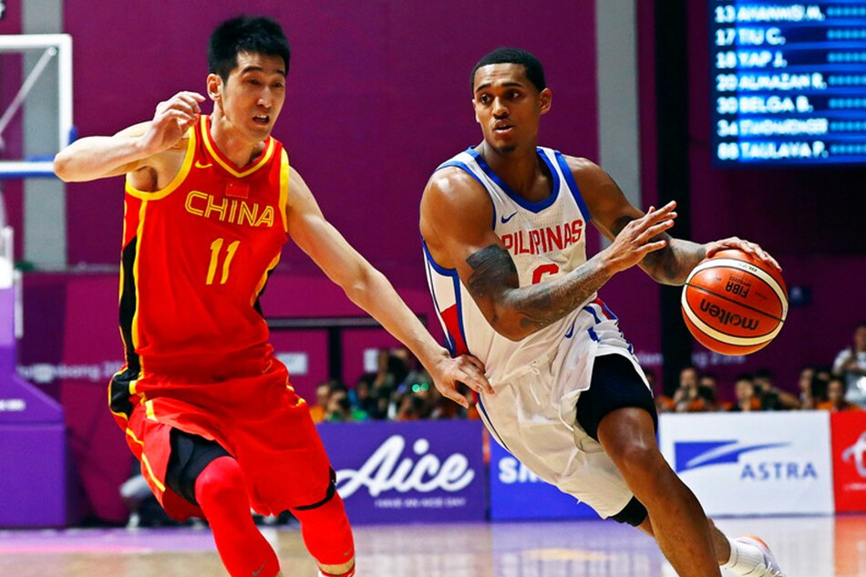 Jordan Clarkson (R) of the Philippines in action against Zhixuan Liu (L) of China during the men's Basketball preliminary round game between the Philippines and China at the Asian Games 2018 in Jakarta, Indonesia, on August 21, 2018. Wu Hong, EPA-EFE/file